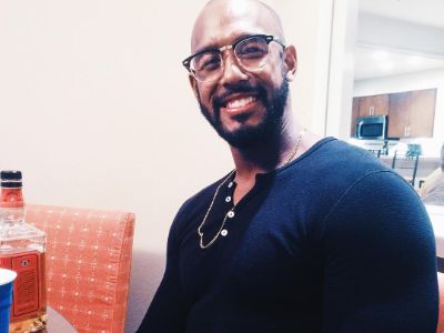 Landon Brown is wearing a black full sleeve shirt, and a small chain in the picture.